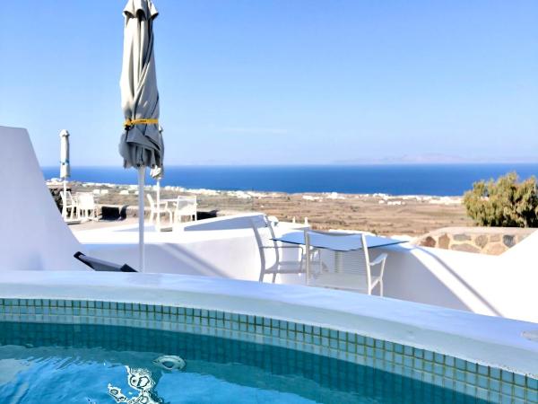 Aperanto Suites : photo 4 de la chambre suite lune de miel avec jacuzzi extérieur chauffé