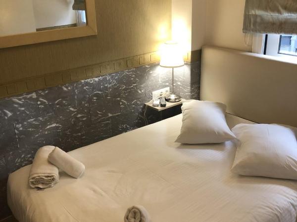 Phidias Hotel : photo 4 de la chambre chambre double ou lits jumeaux