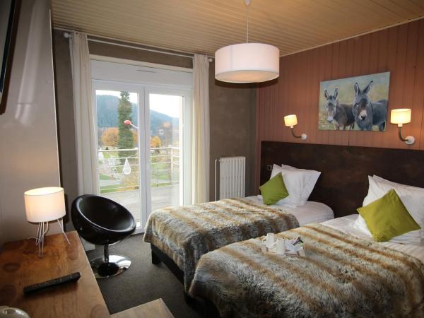 Les Loges Du Parc : photo 2 de la chambre chambre double ou lits jumeaux classique - vue sur lac