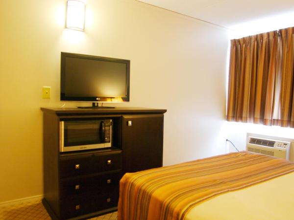 Airport Traveller's Inn : photo 3 de la chambre chambre lit queen-size - non-fumeurs