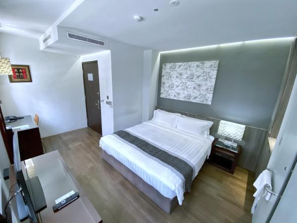 Bliss Hotel Singapore : photo 8 de la chambre chambre lit king-size deluxe