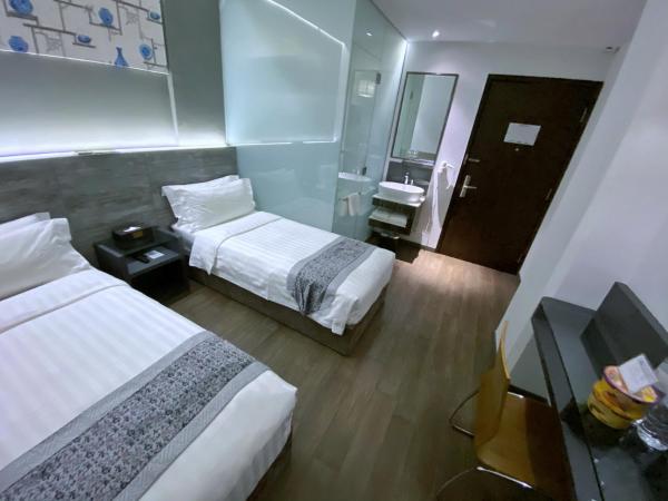 Bliss Hotel Singapore : photo 2 de la chambre chambre lits jumeaux supérieure - sans fenêtre