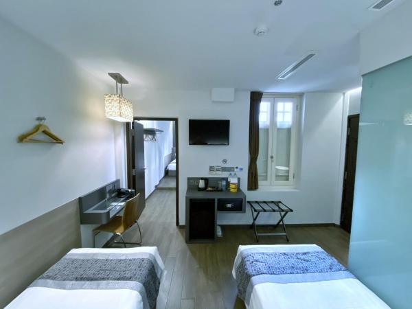 Bliss Hotel Singapore : photo 2 de la chambre chambre familiale - 4 adultes