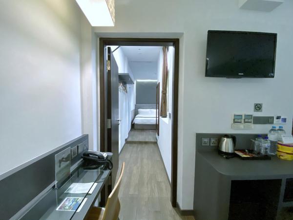 Bliss Hotel Singapore : photo 8 de la chambre chambre familiale - 4 adultes