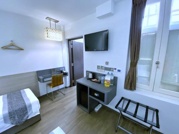 Bliss Hotel Singapore : photo 7 de la chambre chambre familiale - 4 adultes