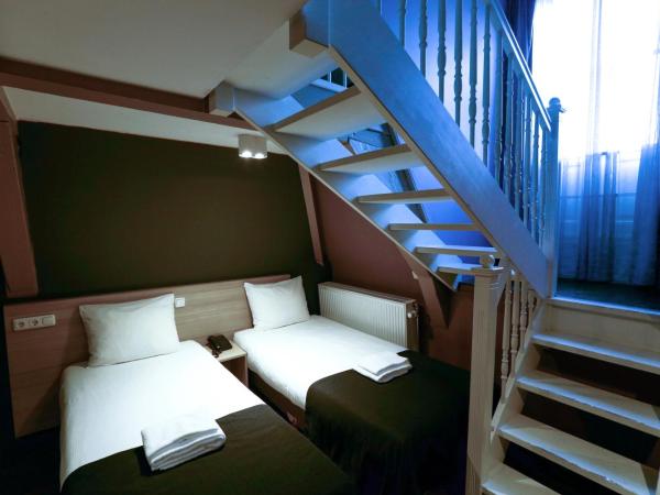 City Hotel Amsterdam : photo 3 de la chambre chambre quadruple