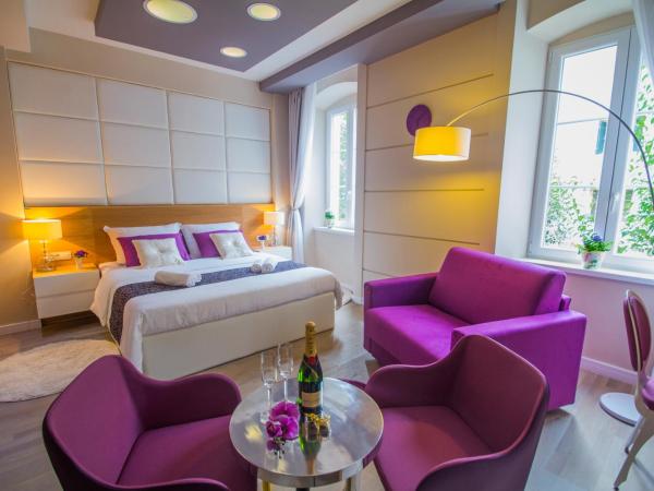 Peninsula Luxury Rooms : photo 5 de la chambre chambre lit king-size supérieure