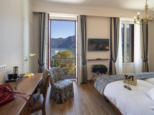 International au Lac Historic Lakeside Hotel : photo 2 de la chambre chambre double ou lits jumeaux panorama avec balcon - vue sur lac