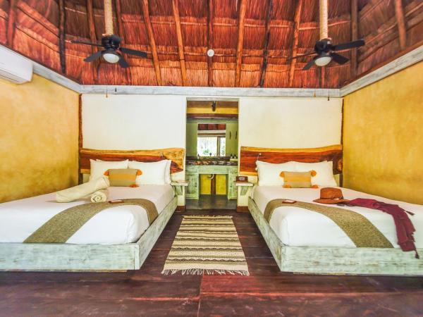 Villa Pescadores Tulum : photo 5 de la chambre chambre double - vue sur jardin