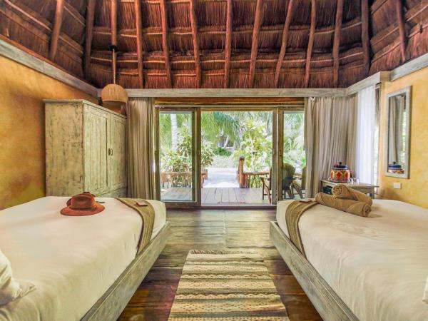 Villa Pescadores Tulum : photo 8 de la chambre chambre double - vue sur jardin