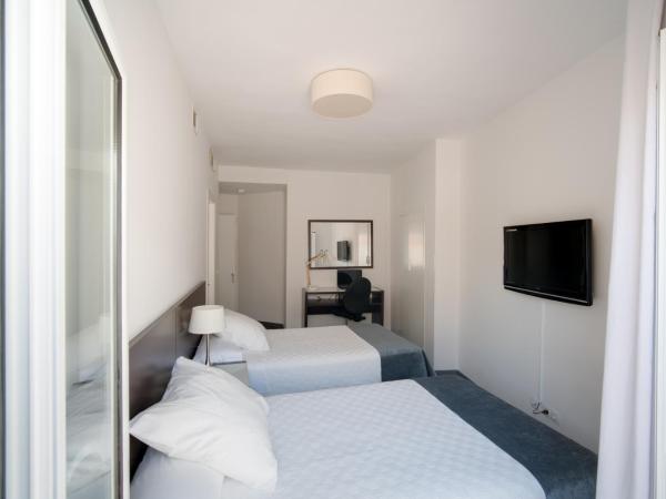 Hotel Madrid de Sevilla : photo 4 de la chambre chambre triple standard