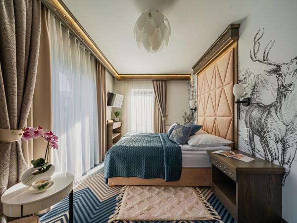 Serce Tatr Residence Zakopane - blisko Krupówek : photo 9 de la chambre chambre double supérieure - vue sur montagne