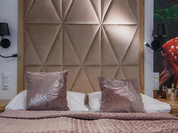 Serce Tatr Residence Zakopane - blisko Krupówek : photo 9 de la chambre chambre double de luxe avec baignoire spa 