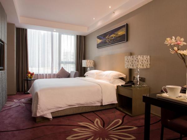 La Perle International Hotel - Free shuttle between hotel and Exhibition Center during Canton Fair & Exhibitor registration Counter : photo 4 de la chambre chambre exécutive lit queen-size