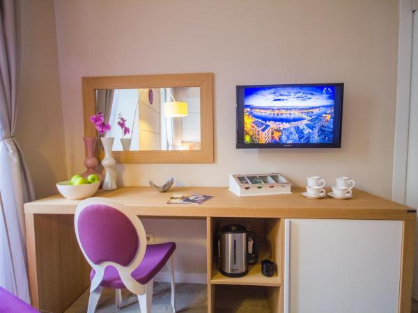 Peninsula Luxury Rooms : photo 8 de la chambre chambre lit king-size supérieure