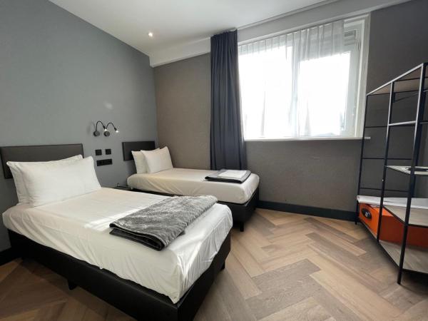 H3 Hotel Rotterdam City Center : photo 1 de la chambre chambre lits jumeaux standard