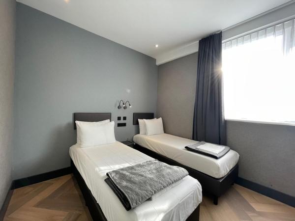 H3 Hotel Rotterdam City Center : photo 2 de la chambre chambre lits jumeaux standard