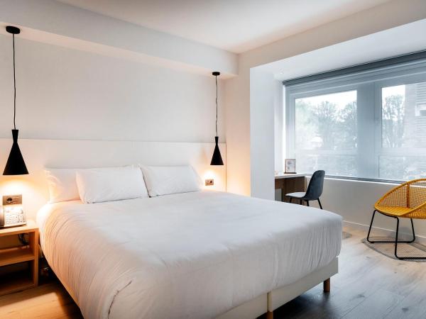 Hotel Distrito Oeste : photo 1 de la chambre chambre lit queen-size