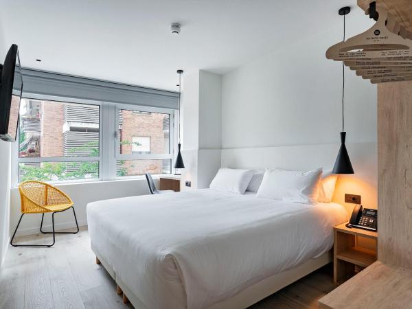 Hotel Distrito Oeste : photo 4 de la chambre chambre lit queen-size