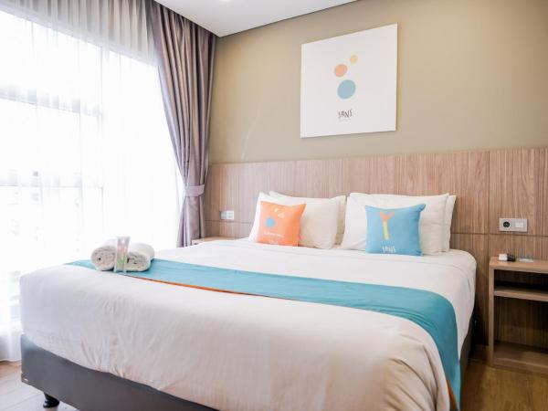 Sans Hotel Puri Indah Jakarta : photo 2 de la chambre suite