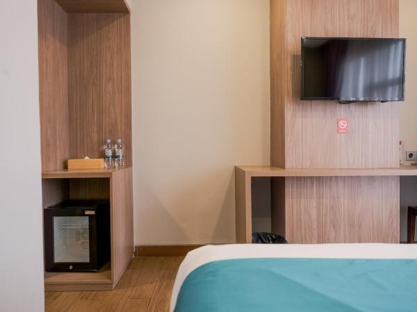 Sans Hotel Puri Indah Jakarta : photo 4 de la chambre chambre deluxe