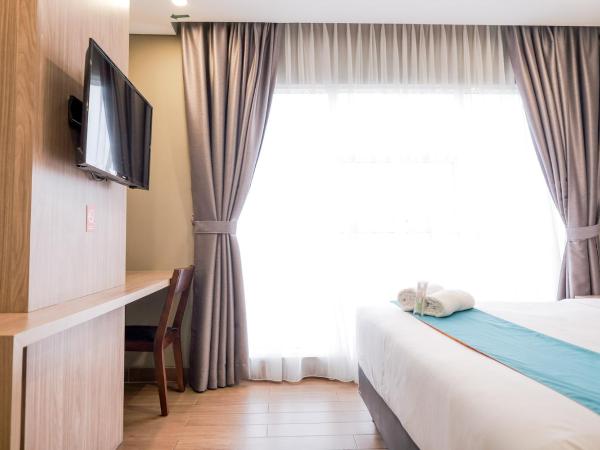 Sans Hotel Puri Indah Jakarta : photo 3 de la chambre suite