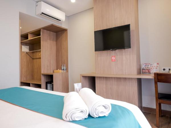 Sans Hotel Puri Indah Jakarta : photo 3 de la chambre chambre deluxe