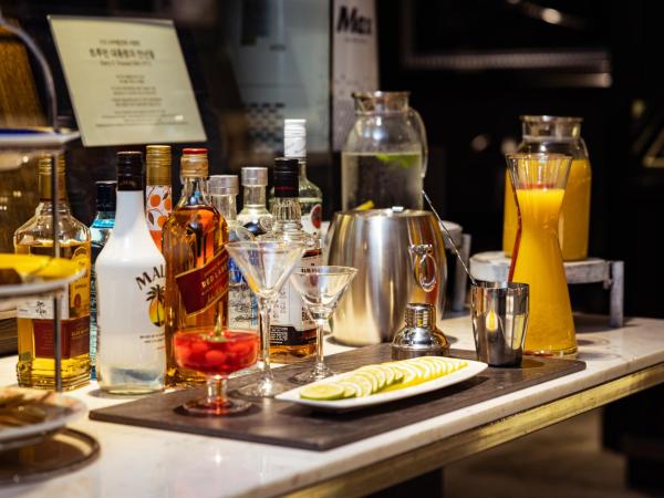 Kensington Hotel Yeouido : photo 4 de la chambre chambre lit king-size exécutive avec accès gratuit au salon