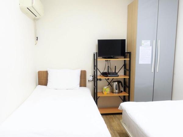 Gangnam Suncity Guesthouse : photo 5 de la chambre chambre lits jumeaux