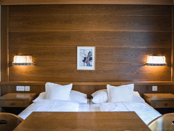 Garni Soldanella : photo 1 de la chambre chambre double supérieure avec balcon