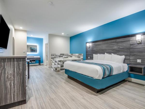 Americas Best Value Inn & Suites Houston at Hwy 6 : photo 5 de la chambre chambre lit king-size - accessible aux personnes à mobilité réduite