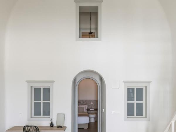 Enigma Suites : photo 9 de la chambre suite signature avec bain à remous