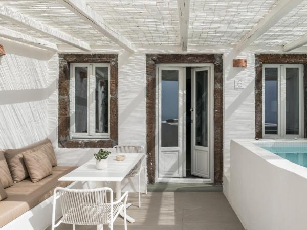 Enigma Suites : photo 2 de la chambre suite signature avec bain à remous