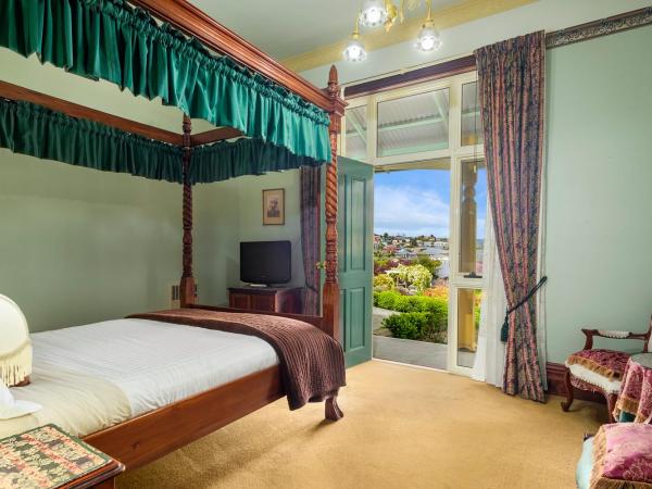 Orana House : photo 1 de la chambre chambre lit queen-size - vue sur jardin