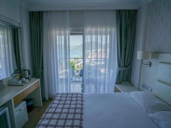 Yunus Hotel : photo 3 de la chambre chambre double deluxe - vue latérale sur mer