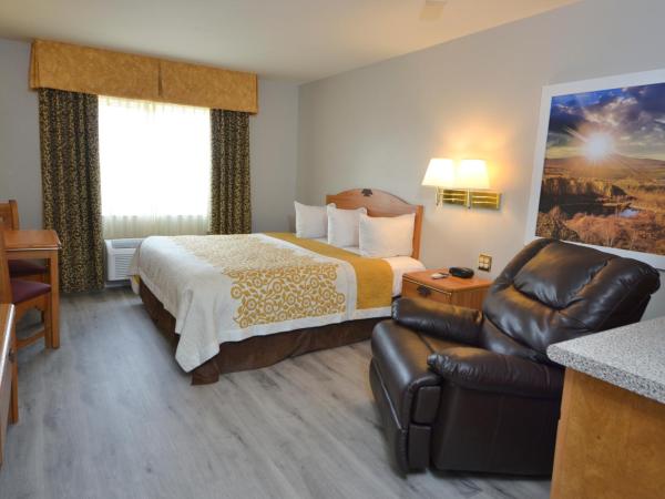 Days Inn & Suites by Wyndham Airport Albuquerque : photo 4 de la chambre chambre lit king-size - non-fumeurs