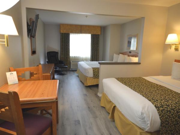 Days Inn & Suites by Wyndham Airport Albuquerque : photo 1 de la chambre chambre lit king-size deluxe - non-fumeurs