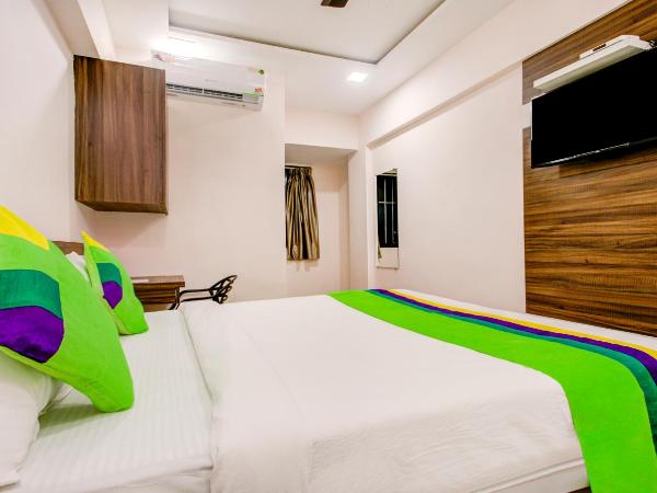 Treebo Trend Kings Inn Vashi : photo 6 de la chambre chambre double Économique