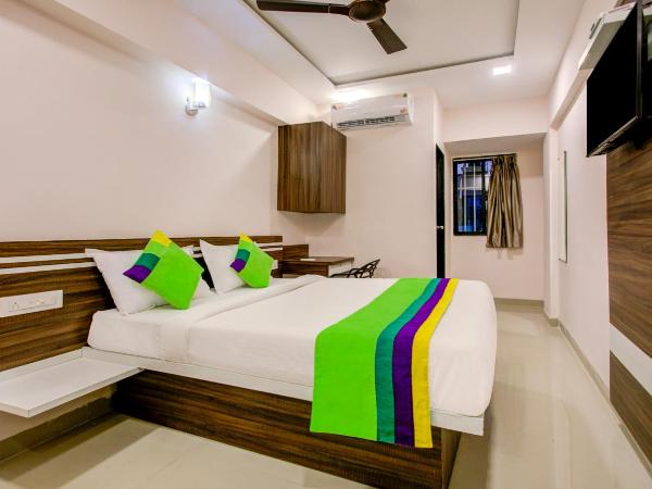 Treebo Trend Kings Inn Vashi : photo 8 de la chambre chambre double Économique