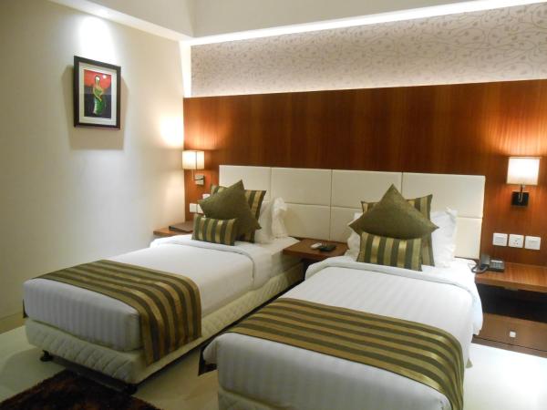 Celesta - Kolkata : photo 4 de la chambre chambre deluxe double ou lits jumeaux