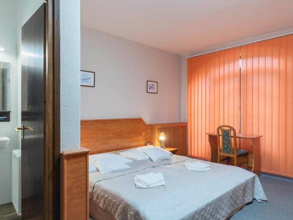 Delanta Panzio : photo 1 de la chambre chambre lits jumeaux