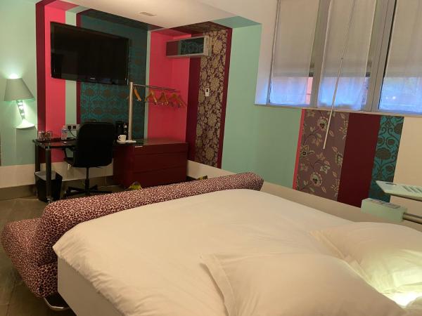 Hôtel Le Dormeur du Val : photo 1 de la chambre chambre familiale avec baignoire