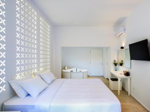 Elia Portou Luxury Residence : photo 10 de la chambre appartement de luxe avec bain à remous