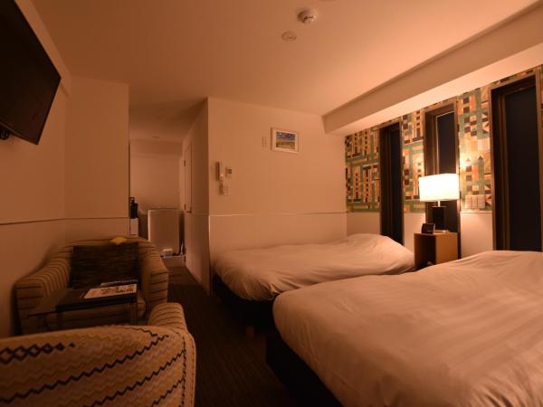 Residence Condominium KALAHAAI : photo 9 de la chambre chambre lits jumeaux deluxe