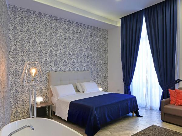 Barbarella HOTEL SPA : photo 1 de la chambre chambre lit queen-size 