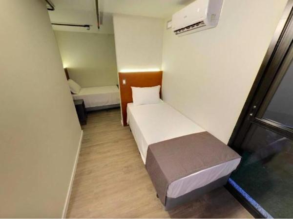 Best Guest Hotel Expo Anhembi : photo 3 de la chambre chambre lits jumeaux pour personnes à mobilité réduite
