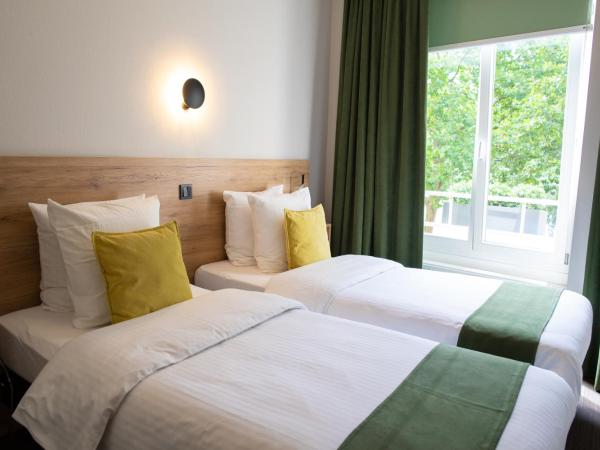 Hotel Vauban : photo 3 de la chambre chambre lits jumeaux standard