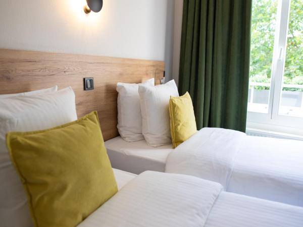 Hotel Vauban : photo 1 de la chambre chambre lits jumeaux standard