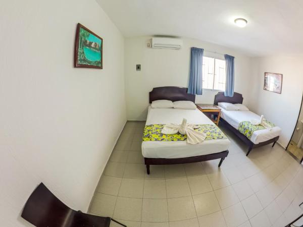 Hotel Isla de Sacrificio : photo 3 de la chambre chambre double standard avec 2 lits doubles