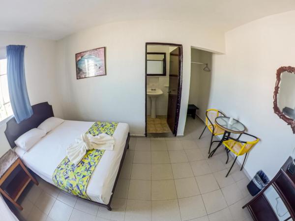 Hotel Isla de Sacrificio : photo 10 de la chambre chambre double standard avec 2 lits doubles